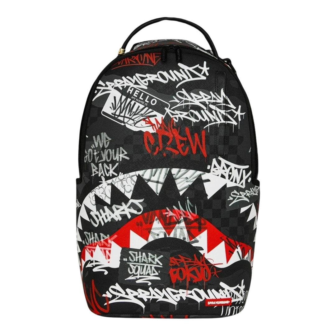 HypeSelection Sprayground Tagged Up DLXSV backpack featuring a black and white graffiti print with iconic shark mouth