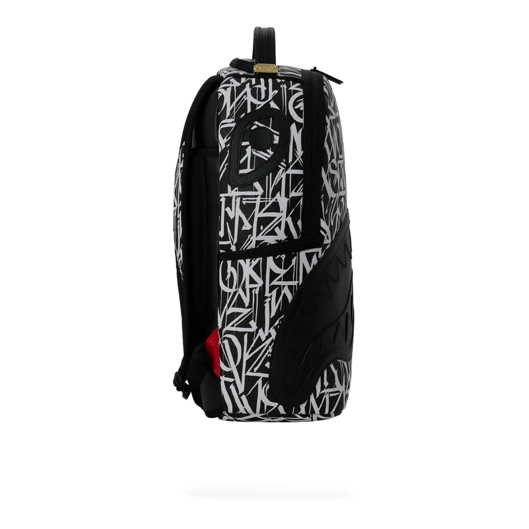 HypeSelection Sprayground Wynwood Walls Defer DLXSV backpack in black and white graffiti print faux leather side view