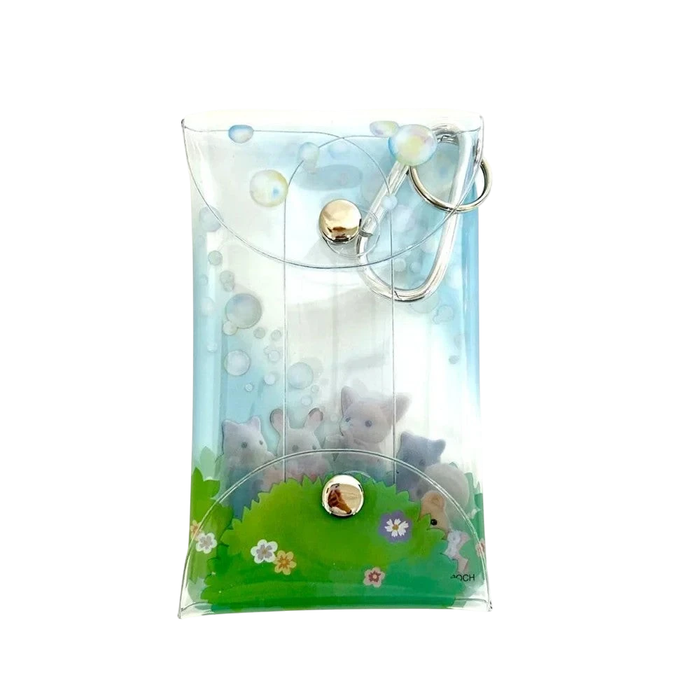 HypeSelection Sylvanian Families clear pouch with a soap bubble design and a snap closure. Features tiny animal figures.