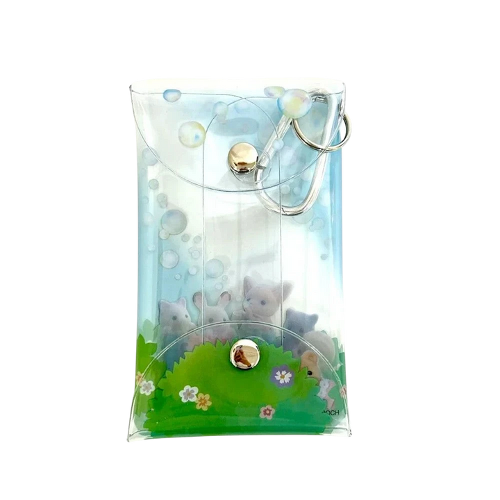 HypeSelection Sylvanian Families clear pouch with a soap bubble design and a snap closure. Features tiny animal figures.