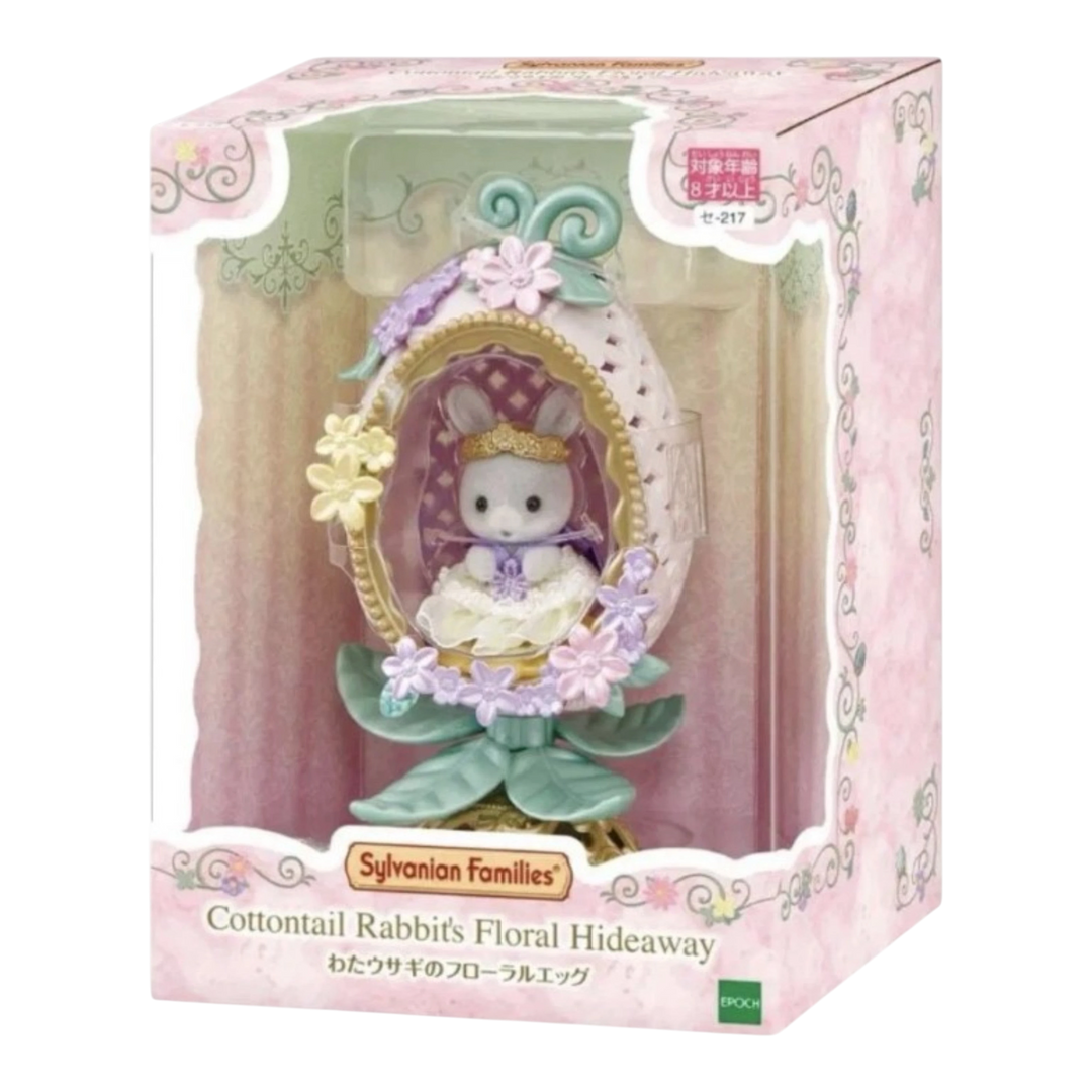 HypeSelection Sylvanian Families Cotton Rabbit baby Angelica in floral costume inside an ornate egg display with floral accents.