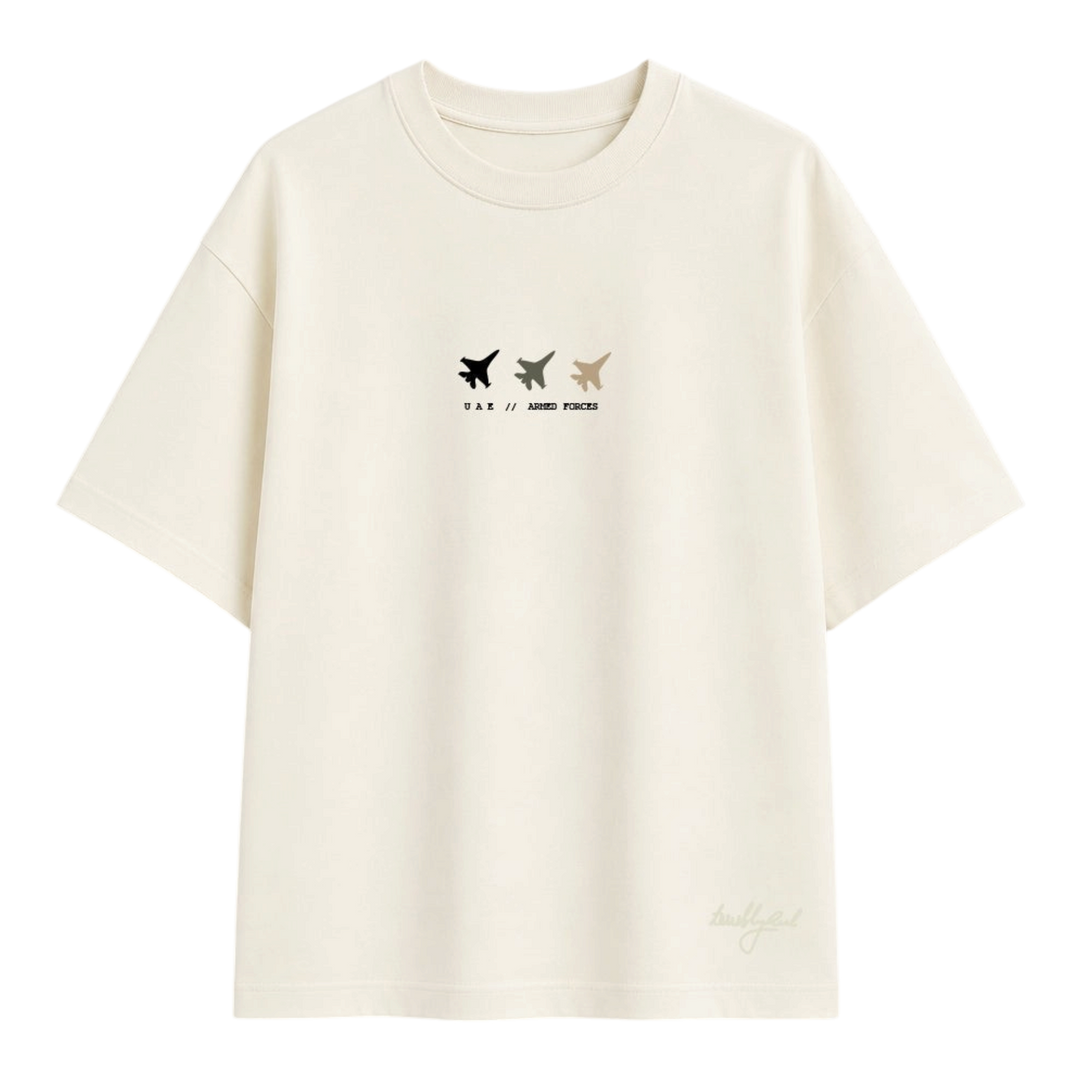 HypeSelection Terribly Real off-white t-shirt featuring UAE Armed Forces aviation graphic with three fighter jets.