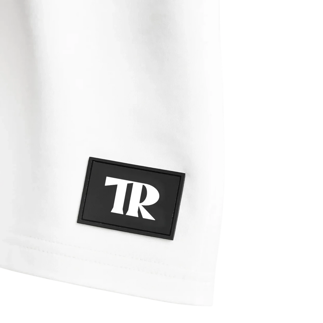 HypeSelection white cotton t-shirt featuring a black rectangular patch with the white TR logo on the hem