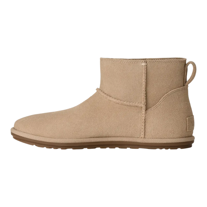HypeSelection UGG Classic Mini Deconstructed boot in sand suede with a relaxed ankle-height profile and flat outsole.
