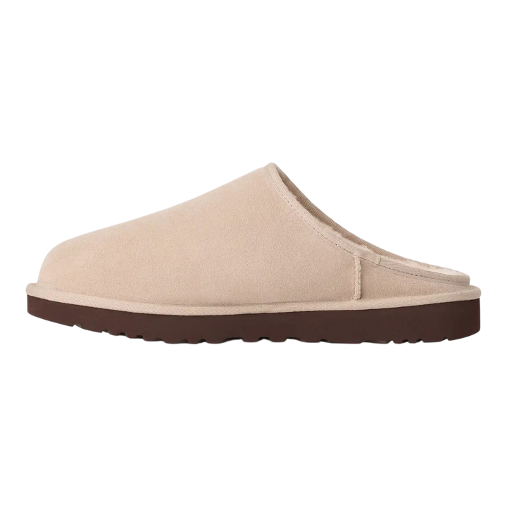 HypeSelection UGG Classic slip-on slipper in moonlight beige suede with a dark brown EVA outsole, side view.