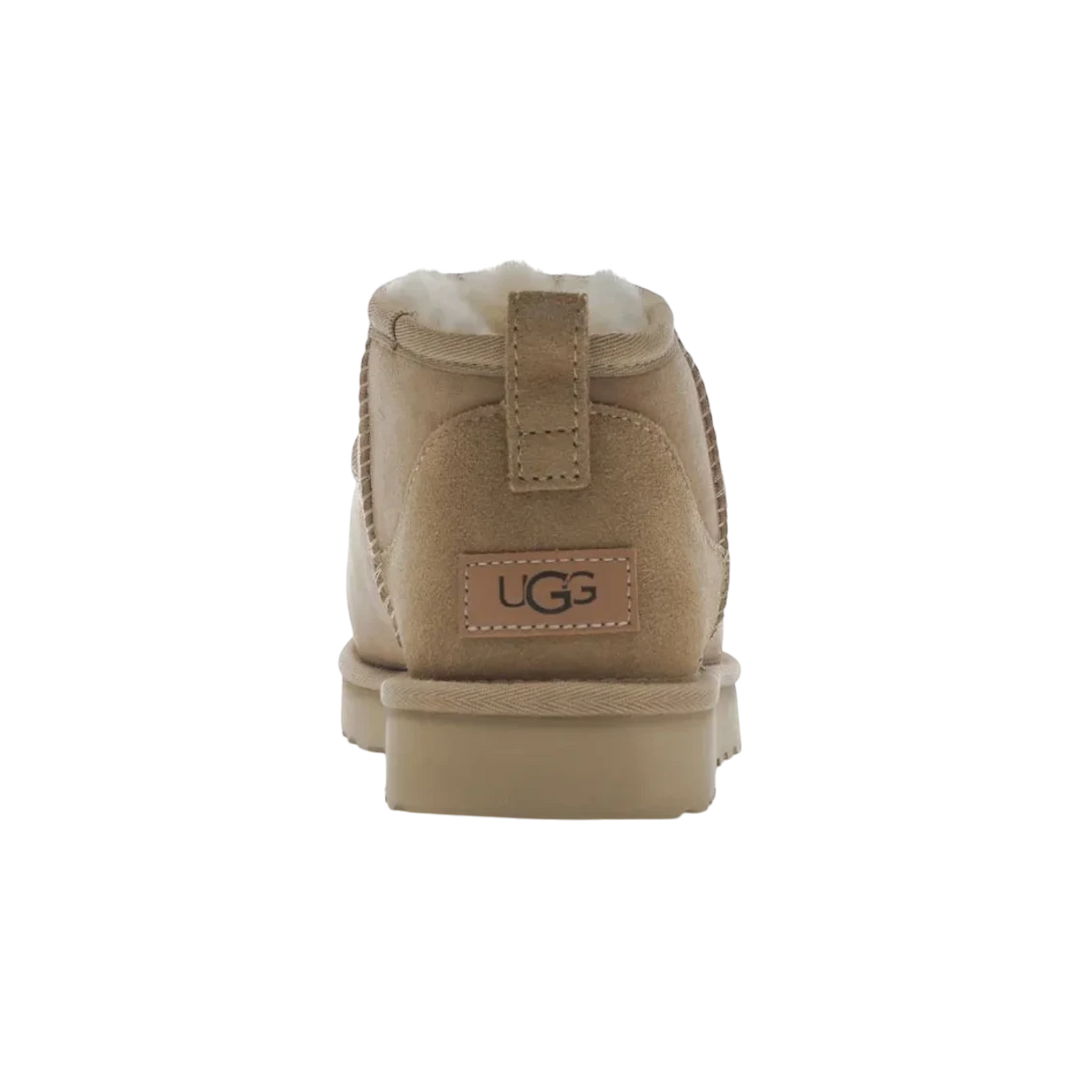 HypeSelection UGG Classic Ultra Mini Boot in Sand, featuring suede and sheepskin upper with UGGplush lining and SugarSole EVA outsole.