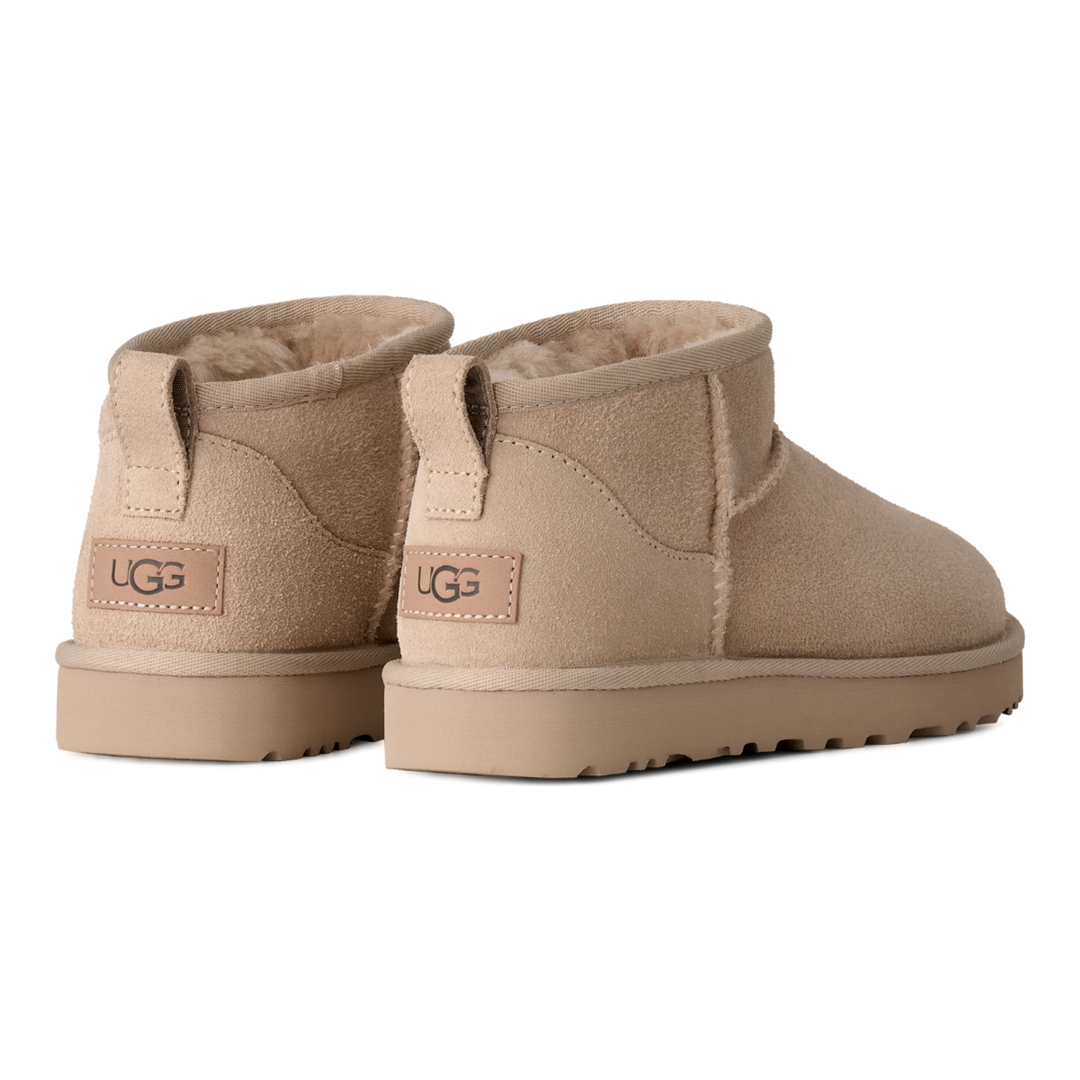 HypeSelection UGG Classic Ultra Mini boots in Moonlight beige suede with rear pull tabs and plush sheepskin lining