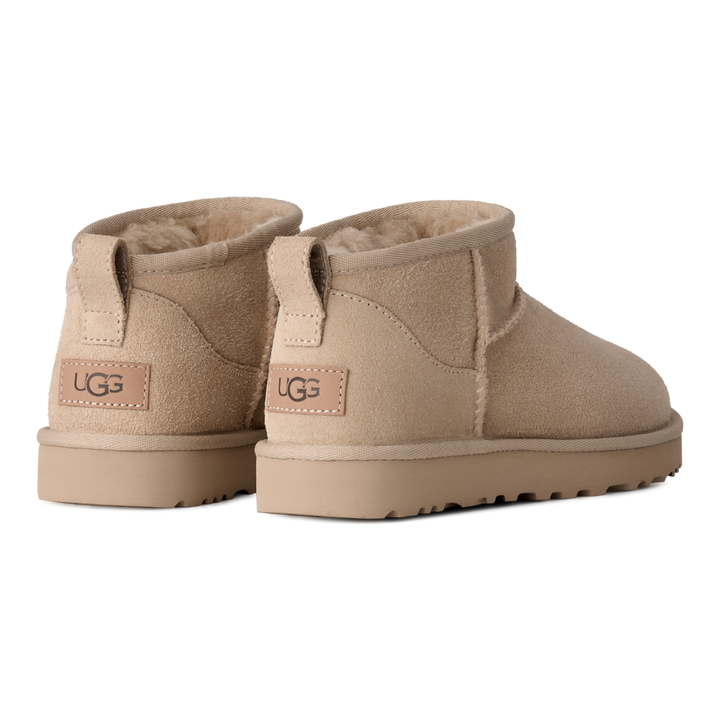 HypeSelection UGG Classic Ultra Mini boots in Moonlight beige suede with rear pull tabs and plush sheepskin lining