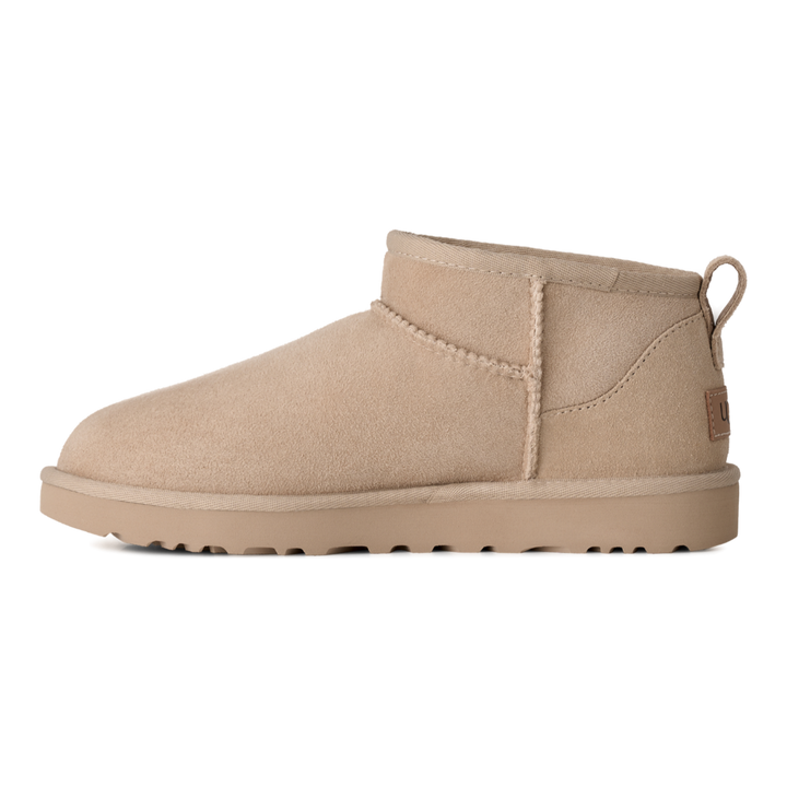 HypeSelection UGG Classic Ultra Mini boot in moonlight beige suede with an asymmetrical topline and pull tab