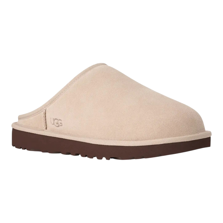 HypeSelection UGG Classic slip-on slipper in moonlight beige suede with a dark brown EVA outsole and side logo.