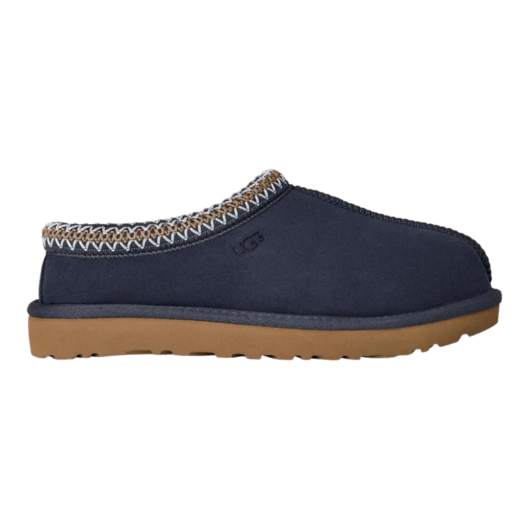 HypeSelection UGG Tasman II slipper in dark indigo suede with signature UGGbraid collar and brown EVA outsole.