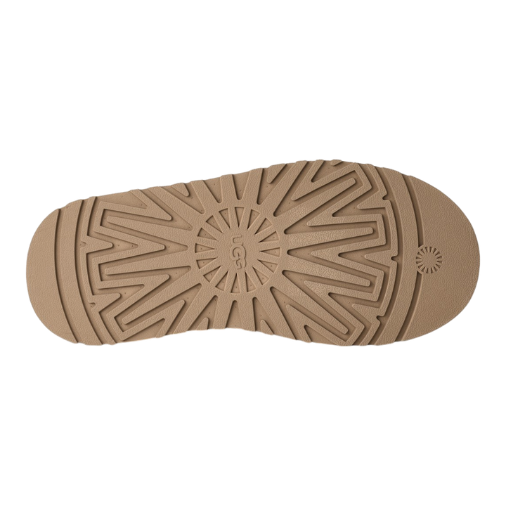HypeSelection UGG Tazz II slipper showing the textured sand-colored EVA platform outsole with signature tread pattern.