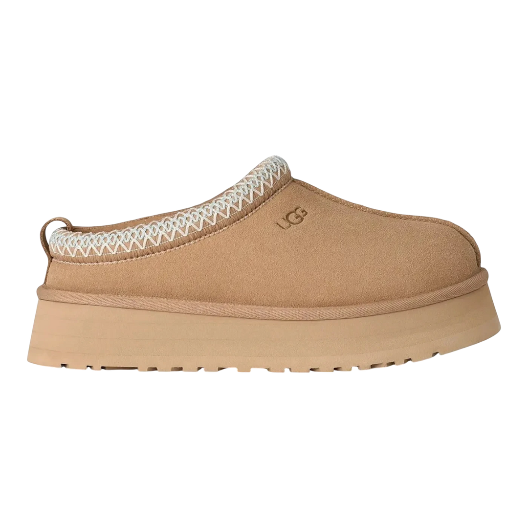 HypeSelection Women's UGG Tazz II Slipper in Sand, crafted from suede with a sheepskin lining and a chunky EVA platform sole.