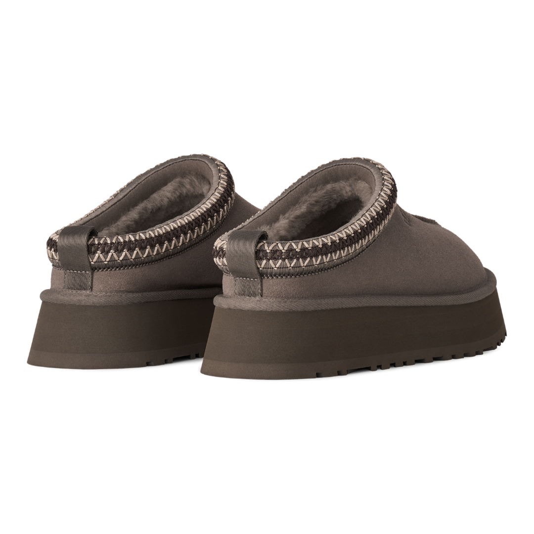 HypeSelection UGG Tazz II slippers in dried oregano suede with a platform sole and signature UGGbraid collar