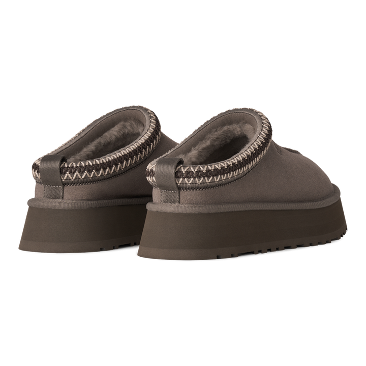 HypeSelection UGG Tazz II slippers in dried oregano suede with a platform sole and signature UGGbraid collar