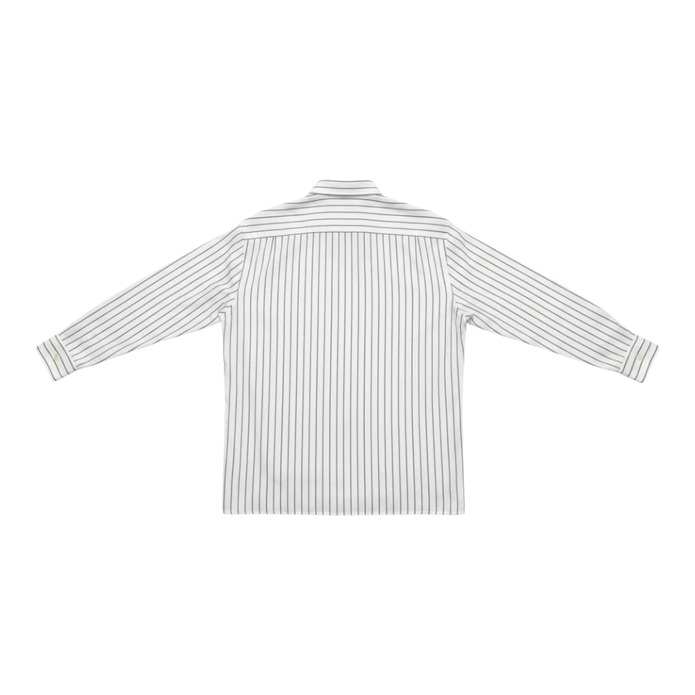 HypeSelection: Uniqlo oversized fit, off-white Oxford cotton shirt with thin dark stripes. Long sleeves, button-up style.