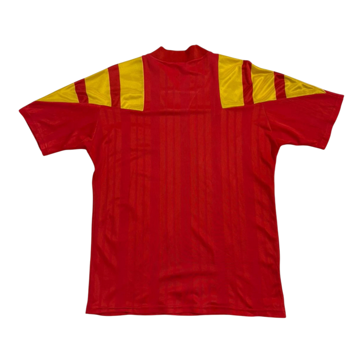 HypeSelection vintage Adidas Spain soccer jersey in red with yellow shoulder stripes and subtle vertical texture.