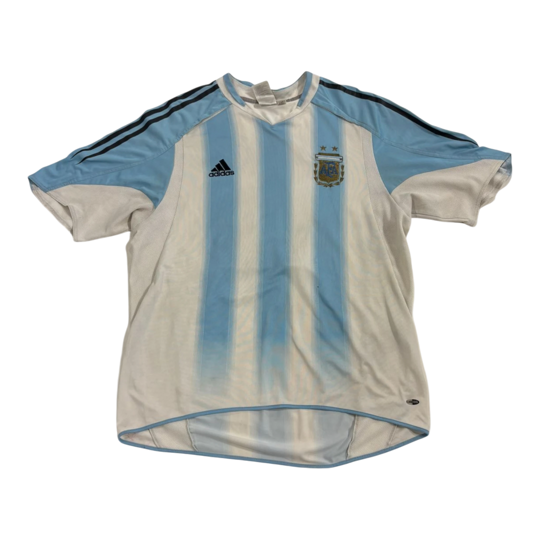 Vintage HypeSelection Adidas Argentina soccer jersey in white and light blue with team crest and black stripes.