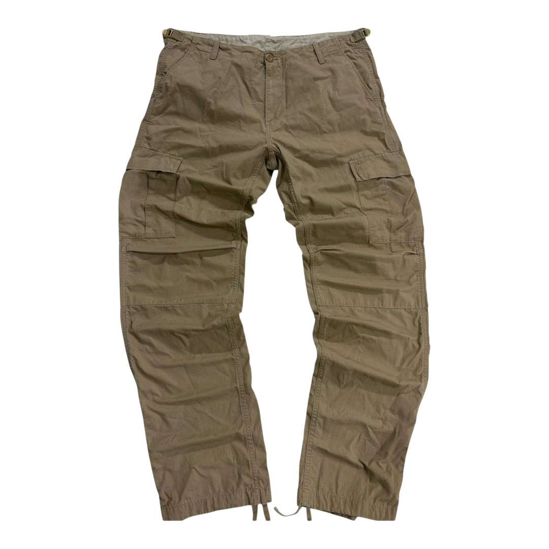 HypeSelection vintage brown cargo pants with multiple pockets and adjustable ankle cuffs. Cotton blend.