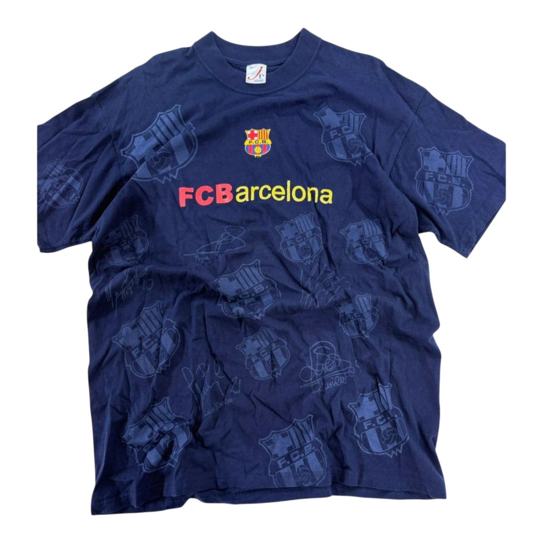 HypeSelection vintage navy blue FC Barcelona all-over print t-shirt with FCB barcelona text and crest graphic.