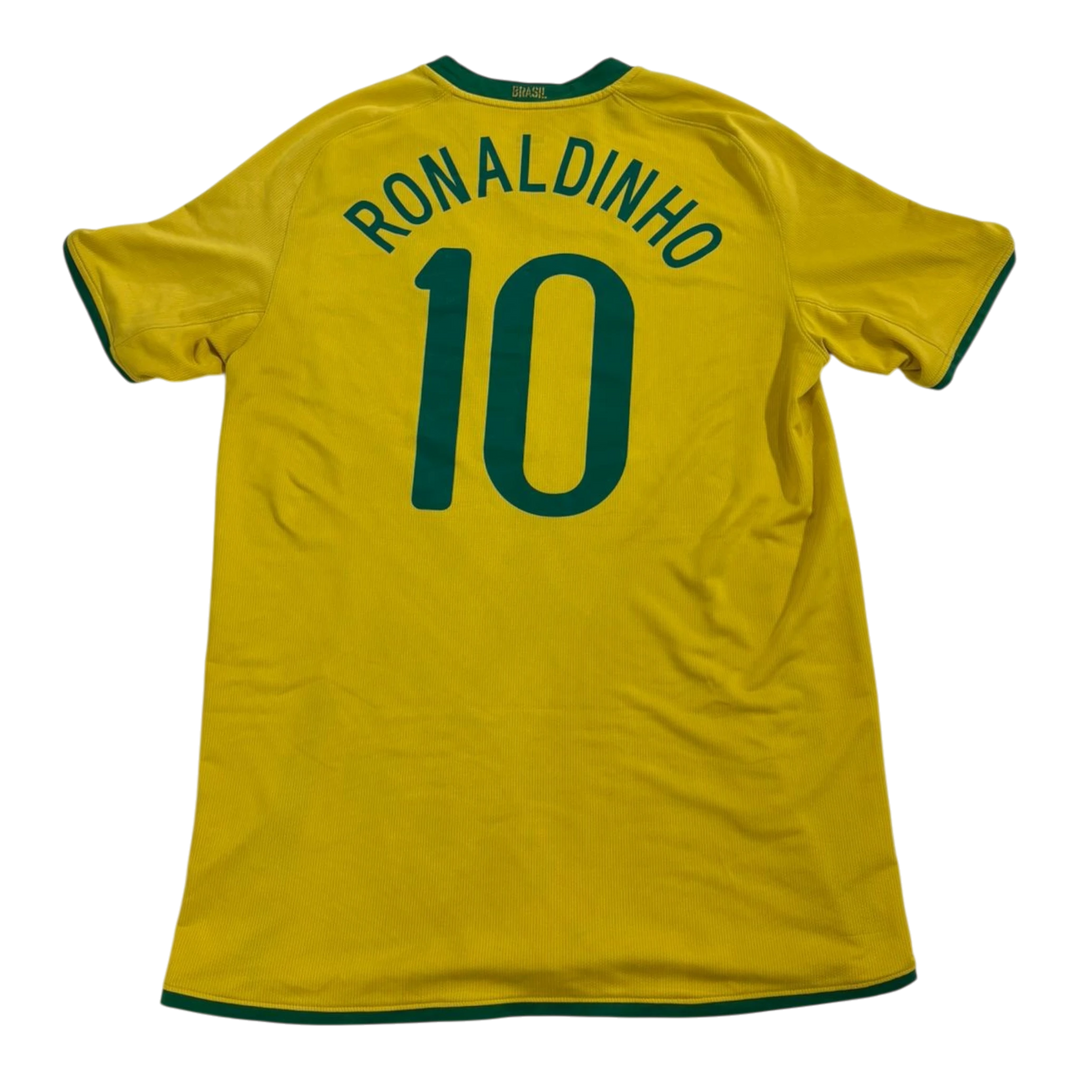 HypeSelection Vintage Nike Brazil yellow soccer jersey with green trim, featuring