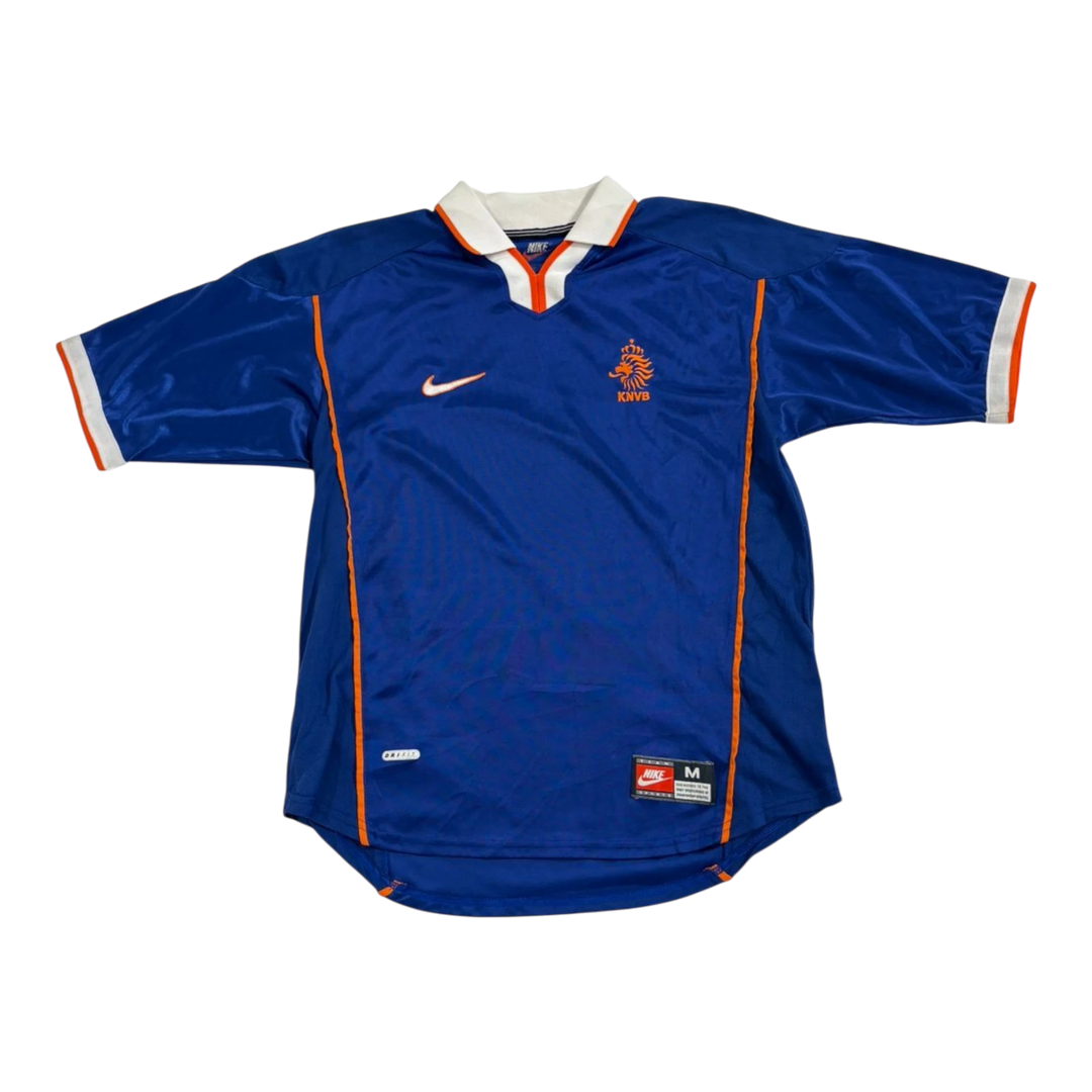 Vintage Nike Netherlands blue soccer jersey with orange trim and white collar. Features Nike logo and KNVB crest.