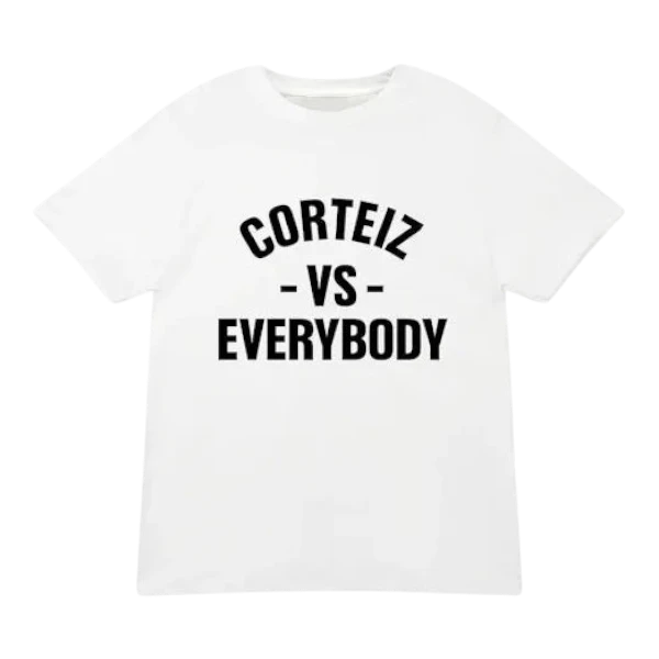 HypeSelection white 100% cotton t-shirt with black 'CORTEIZ VS EVERYBODY' graphic print on the front, relaxed fit.