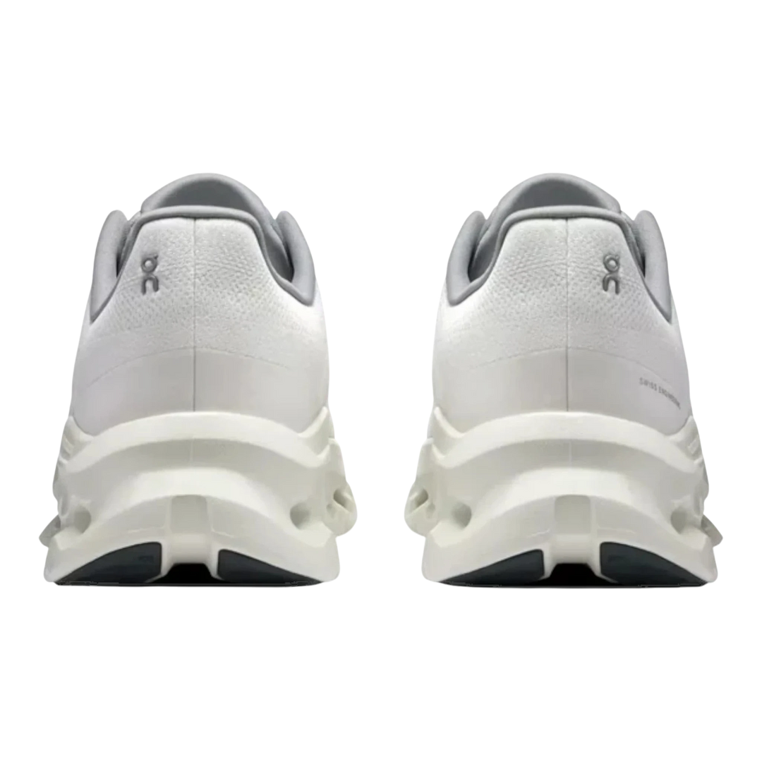 HypeSelection white running shoes with grey accents and unique sole design. Back view.