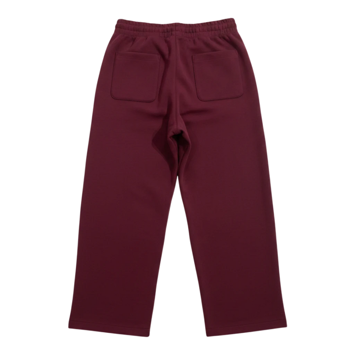 HypeSelection wine red wide-leg sweatpants with dual-texture cotton-polyester fabric and adjustable hem drawstrings.