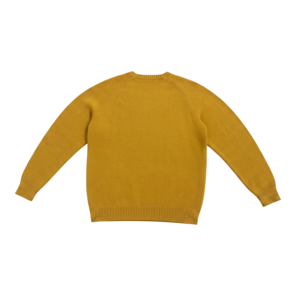 HypeSelection Uniqlo x KAWS yellow lambswool crew neck sweater with embroidered details. Lightweight knit for layering.