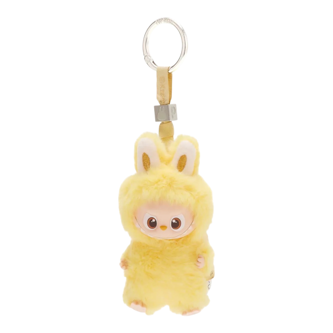 HypeSelection yellow plush Labubu monster pendant with vinyl face and bunny ears, attached to a keychain.