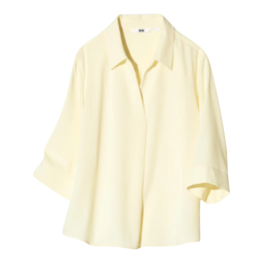 HypeSelection yellow rayon-blend blouse with 3/4 sleeves and skipper collar. Wrinkle-resistant fabric.