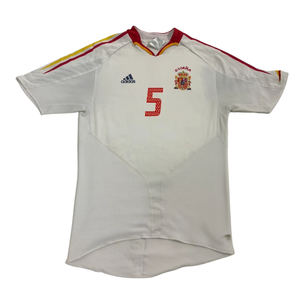 Vintage Adidas Spain Puyol jersey with red number 5 on front. White with red and yellow accents.