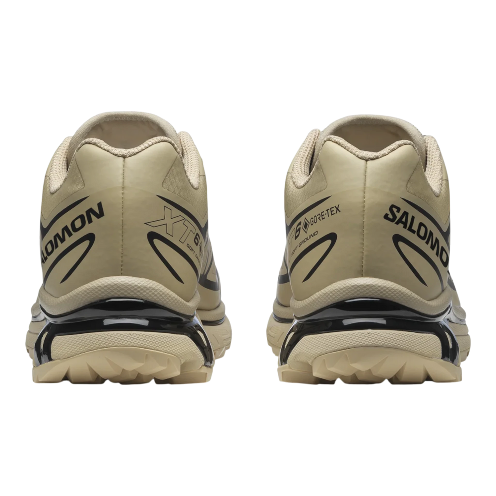 Salomon XT-6 GORE-TEX trail running shoes in safari beige with black accents and logos. Waterproof and breathable.