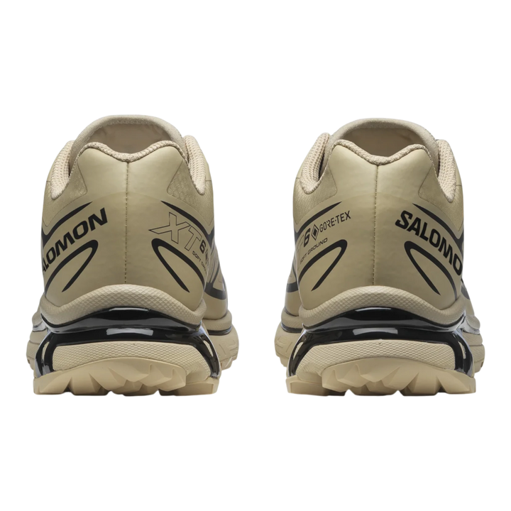 Salomon XT-6 GORE-TEX trail running shoes in safari beige with black accents and logos. Waterproof and breathable.