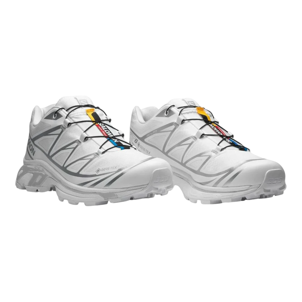 Salomon XT6 white and silver Gore-Tex trail running shoes with Quicklace system and layered design.