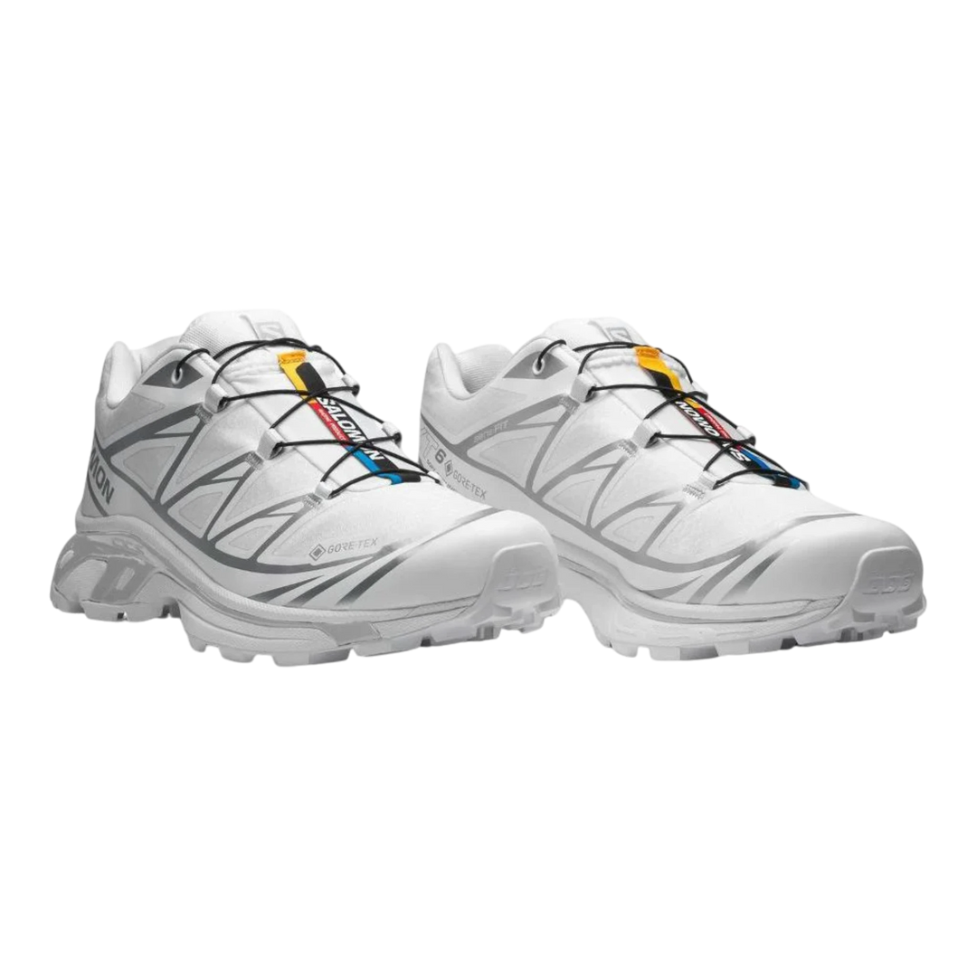 Salomon XT6 white and silver Gore-Tex trail running shoes with Quicklace system and layered design.